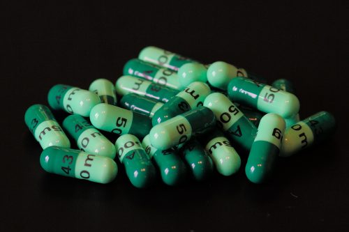 A course of green cefalexin pills
